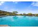 Inviting community pool with mountain views and lounge chairs at 10638 E Blanche Dr, Scottsdale, AZ 85255