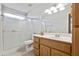 Clean bathroom featuring a vanity, toilet and shower at 10826 N 115Th Ave, Youngtown, AZ 85363