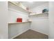 Spacious walk-in closet with ample shelving at 10826 N 115Th Ave, Youngtown, AZ 85363