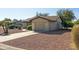 Single-story home with attached garage and desert landscaping at 10826 N 115Th Ave, Youngtown, AZ 85363