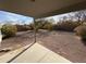 Private backyard with gravel landscaping and covered patio at 11658 N 153Rd Ave, Surprise, AZ 85379