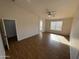 Spacious main bedroom with large window and wood flooring at 11658 N 153Rd Ave, Surprise, AZ 85379