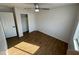 Bedroom with ceiling fan and closet at 11658 N 153Rd Ave, Surprise, AZ 85379