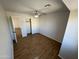 Spacious bedroom with wood-look floors and access to a closet at 11658 N 153Rd Ave, Surprise, AZ 85379