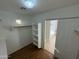 Bright closet with shelving and access to bathroom at 11658 N 153Rd Ave, Surprise, AZ 85379