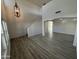 Bright living room with high ceilings, hardwood floors, and loft area at 11658 N 153Rd Ave, Surprise, AZ 85379