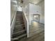 Open staircase leading to an upstairs loft area at 11658 N 153Rd Ave, Surprise, AZ 85379