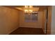 Simple dining area with hardwood floors and light walls at 1305 W Isabella Ave, Mesa, AZ 85202