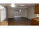 Kitchen with dark wood cabinets, tile floors, and sliding door to patio at 1305 W Isabella Ave, Mesa, AZ 85202