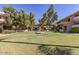 Landscaped courtyard with fountain and benches at 1331 W Baseline Rd # 244, Mesa, AZ 85202