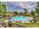 Community pool with plenty of lounge chairs and seating areas at 1331 W Baseline Rd # 244, Mesa, AZ 85202