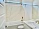 Clean bathroom with white vanity, marble shower surround, and bathtub at 15371 W Desert Hollow Dr, Surprise, AZ 85387