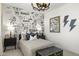 bedroom with robot themed wall and full bed at 15374 W Hackamore Dr, Surprise, AZ 85387