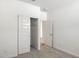 Bedroom closet with sliding doors and shelving at 15429 W Hackamore Dr, Surprise, AZ 85387