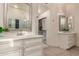 Double vanity bathroom with ample storage and a large mirror at 15639 E Palomino Blvd, Fountain Hills, AZ 85268