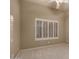 Well-lit bedroom featuring plantation shutters and ceiling fan at 15639 E Palomino Blvd, Fountain Hills, AZ 85268