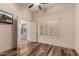 Bedroom with wood floors, plantation shutters and backyard access at 15639 E Palomino Blvd, Fountain Hills, AZ 85268