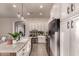 Modern kitchen with granite countertops and white cabinets at 15639 E Palomino Blvd, Fountain Hills, AZ 85268