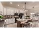 Modern kitchen with granite countertops and white cabinets at 15639 E Palomino Blvd, Fountain Hills, AZ 85268