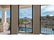 Stunning mountain and pool view from window at 16439 E Nicklaus Dr, Fountain Hills, AZ 85268