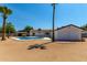 View of the home from the backyard, including the pool at 17052 N 36Th Ct, Phoenix, AZ 85032