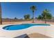 Relaxing kidney-shaped pool with ample surrounding space at 17052 N 36Th Ct, Phoenix, AZ 85032