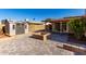 Spacious backyard patio with fire pit and storage shed at 1741 N Lehmberg Ave, Casa Grande, AZ 85122