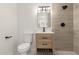 Modern bathroom with walk-in shower and wood vanity at 1741 N Lehmberg Ave, Casa Grande, AZ 85122