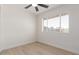 Spacious bedroom with large window and wood floors at 1741 N Lehmberg Ave, Casa Grande, AZ 85122