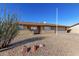 Single story home with a landscaped front yard and attached garage at 1741 N Lehmberg Ave, Casa Grande, AZ 85122