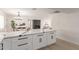 Modern kitchen with white cabinets and marble countertops at 1741 N Lehmberg Ave, Casa Grande, AZ 85122