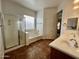 Bathroom features double vanity and a large shower at 17597 W Aster Dr, Surprise, AZ 85388