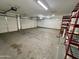 Spacious garage with storage shelving and ample space at 17597 W Aster Dr, Surprise, AZ 85388