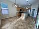 Bright kitchen with an island and wood cabinets at 17597 W Aster Dr, Surprise, AZ 85388