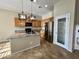 Kitchen with granite countertops, stainless steel appliances, and an island at 17597 W Aster Dr, Surprise, AZ 85388