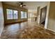 Bright and airy living room with tile floors at 17597 W Aster Dr, Surprise, AZ 85388