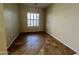 Bright office with tile flooring and plantation shutters at 17597 W Aster Dr, Surprise, AZ 85388