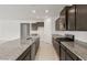 Well-appointed kitchen featuring granite countertops, stainless appliances and stylish cabinetry at 17638 W Rancho Dr, Litchfield Park, AZ 85340