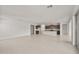 Spacious living area showcases a modern open floor plan and leads into the kitchen at 17638 W Rancho Dr, Litchfield Park, AZ 85340
