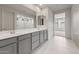 Elegant bathroom with double vanity and modern fixtures at 17644 W Rancho Dr, Litchfield Park, AZ 85340