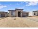 Single-story home with stone accents and a two-car garage at 18221 E Paria Canyon Dr, Rio Verde, AZ 85263