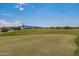 Golf course putting green with desert landscape and mountain views at 18221 E Paria Canyon Dr, Rio Verde, AZ 85263