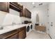 Laundry room with washer, dryer, and ample storage at 18221 E Paria Canyon Dr, Rio Verde, AZ 85263