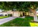 Cute one-story home with attached garage and well-manicured lawn at 19098 N 97Th Ln, Peoria, AZ 85382