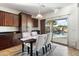 Cozy breakfast nook with table and chairs overlooking the backyard at 19146 W Pasadena Ave, Litchfield Park, AZ 85340