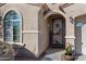 Inviting entryway with decorative door and welcoming sign at 19146 W Pasadena Ave, Litchfield Park, AZ 85340