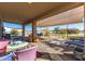 Covered patio with outdoor furniture and a view of the backyard at 19350 W Clarendon Ave, Litchfield Park, AZ 85340