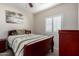 Guest bedroom with double bed and wooden dresser at 20518 N 261St Ave, Buckeye, AZ 85396