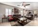 Open living room with a view into the kitchen and dining areas at 20518 N 261St Ave, Buckeye, AZ 85396