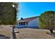 View of home's back and screened patio area at 20619 N Echo Mesa Dr, Sun City West, AZ 85375